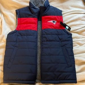 A reversible patriots vest!! Super fuzzy and will keep you warm